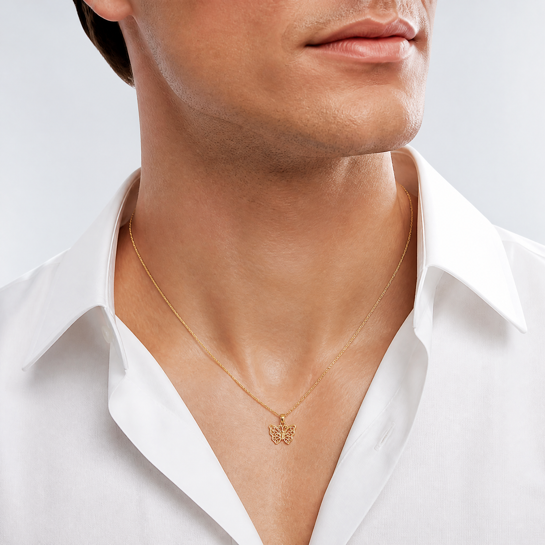 14K Cut-Out Small Butterfly Charm - Model Shot