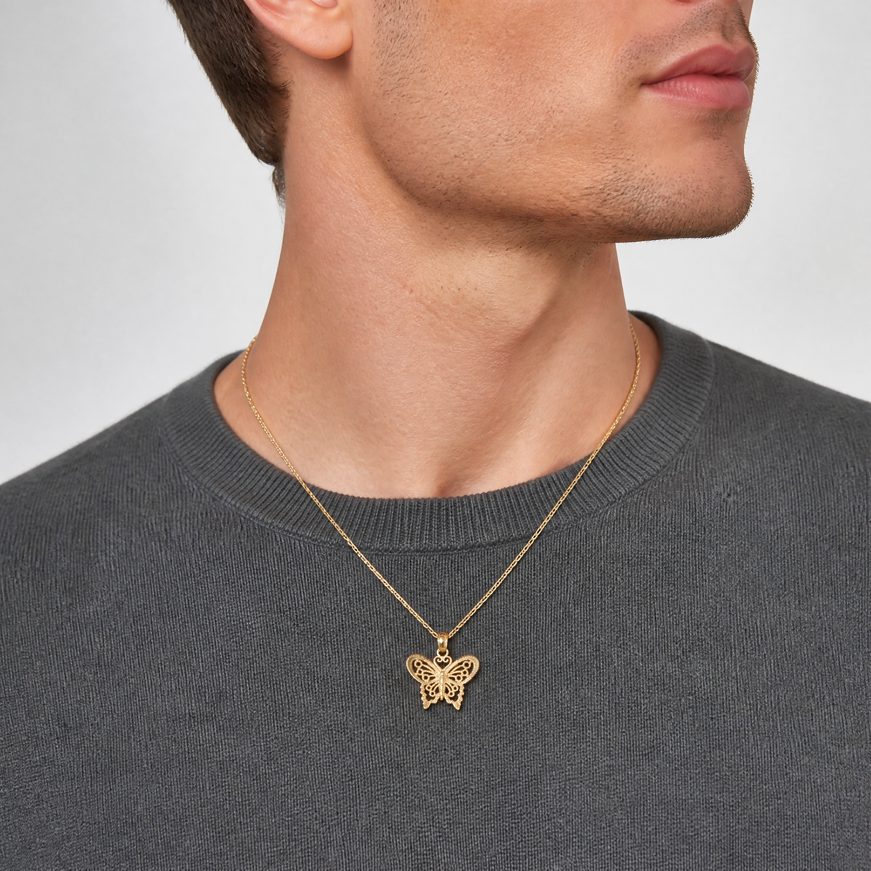 14K Polished and Textured Filigree Butterfly Charm - Model Shot