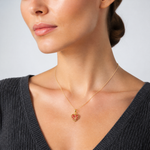 14K 3-D Reversible Heart Opens Charm - Model Shot