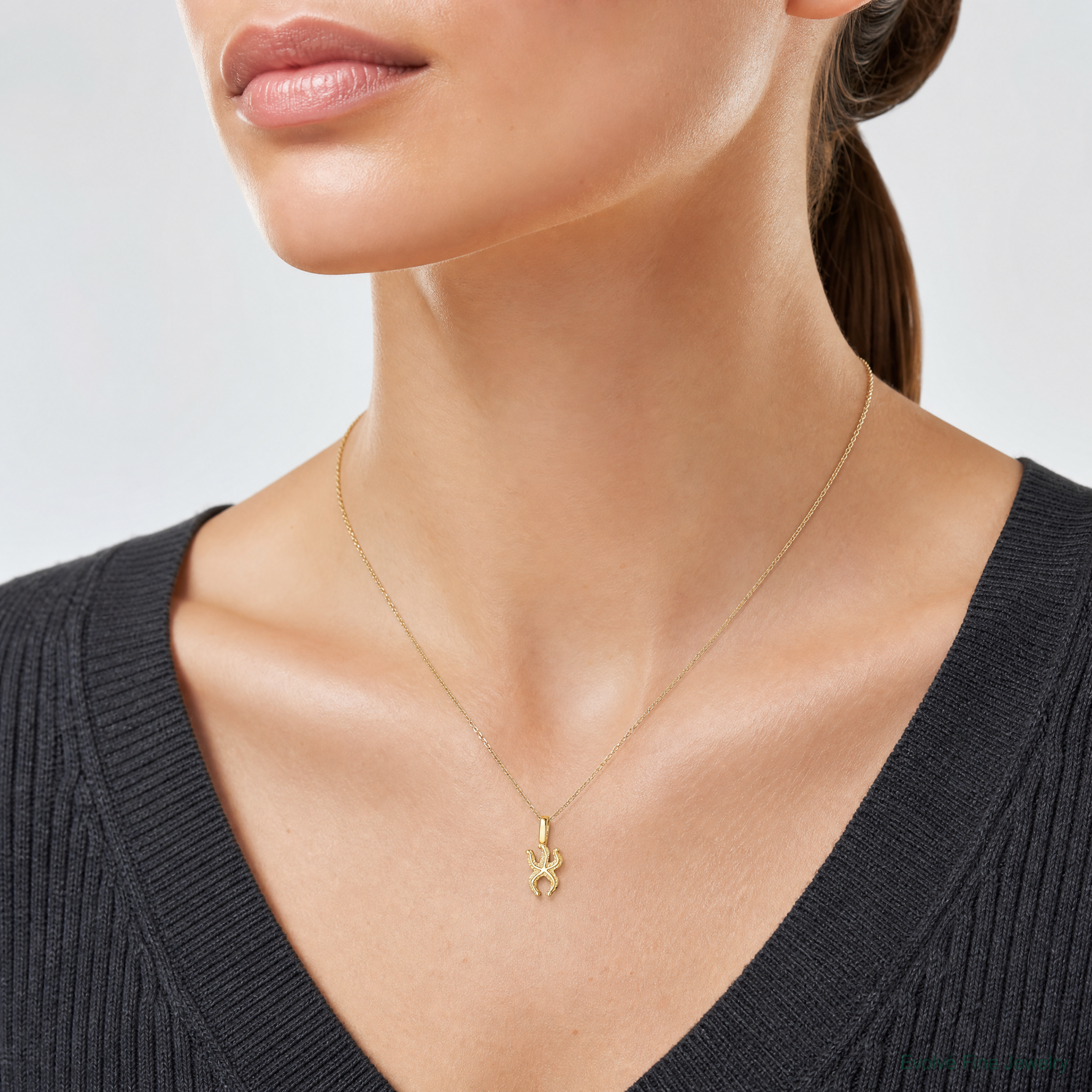 14K Mini Starfish with Fixed Bail Charm - Model Shot