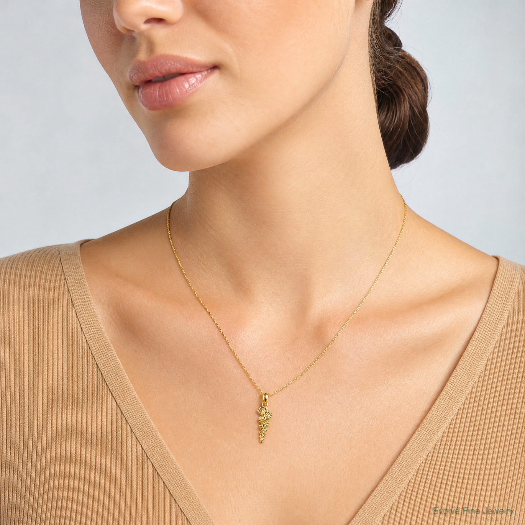 14K 3-D Mini Common Wentletrap Shell Charm - Model Shot