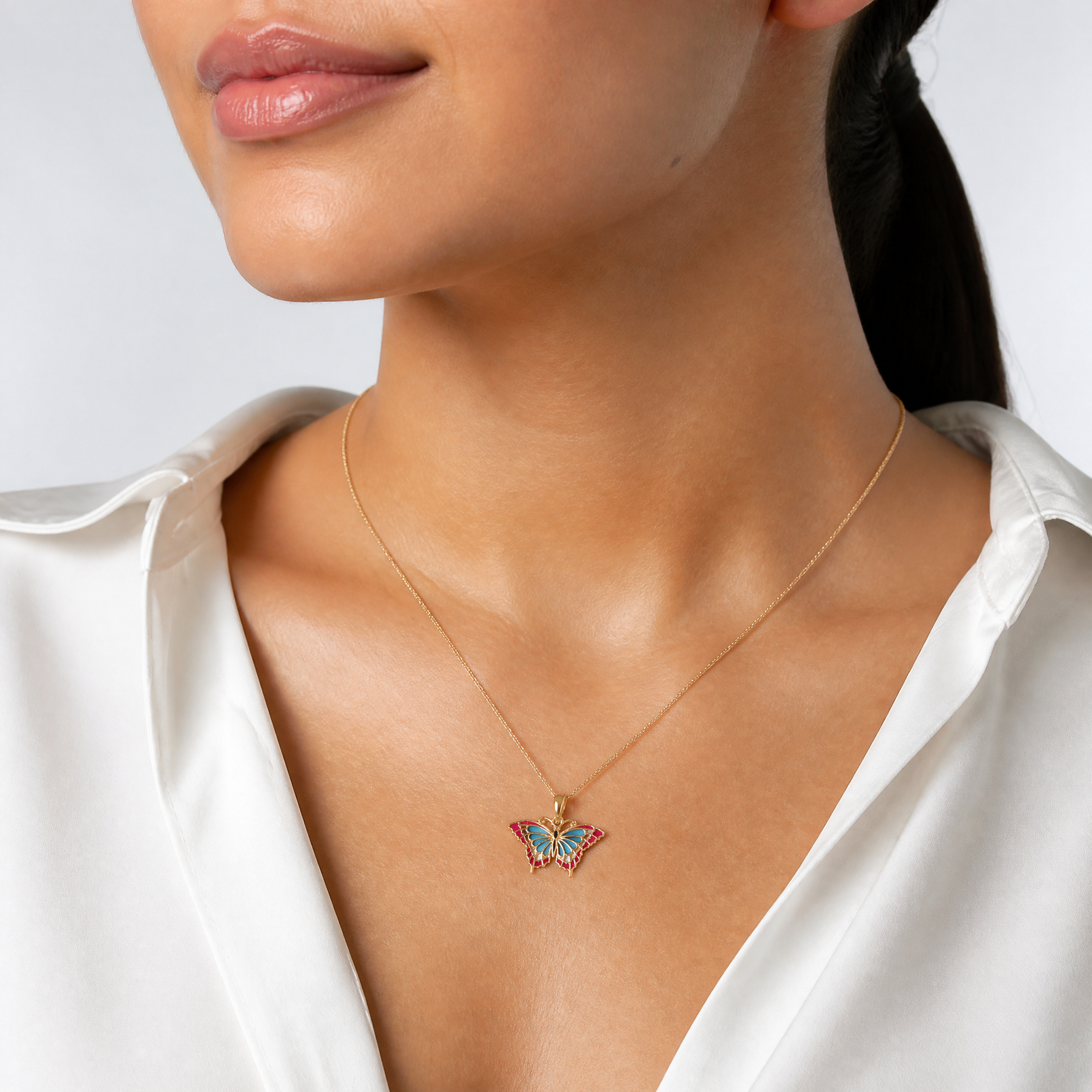 14K Small Enameled Blue and Red Butterfly Charm - Model Shot