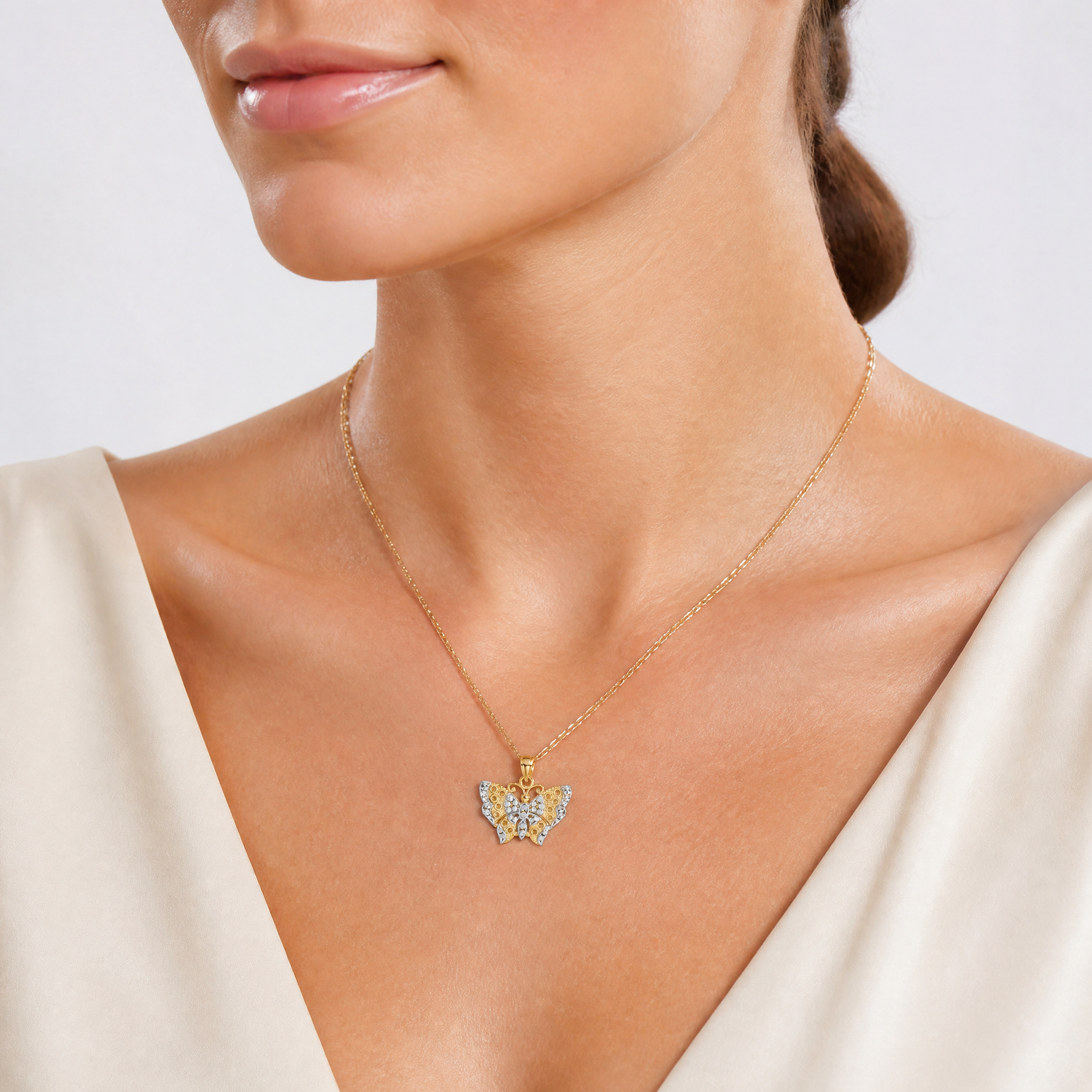 14k w/Rhodium Cut-out Wings Butterfly Pendant - Model Shot