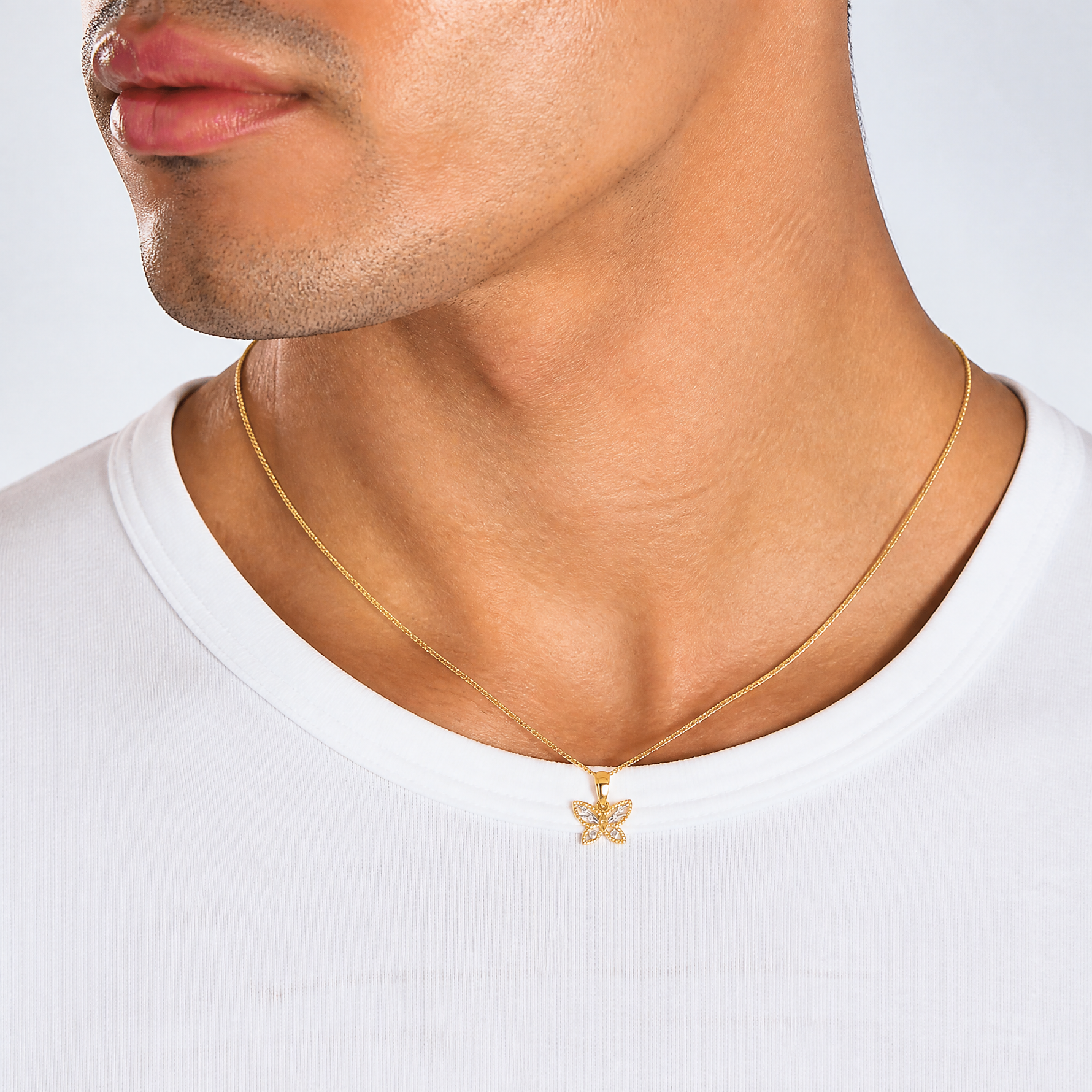 14k w/ Rhodium Diamond-cut Butterfly Charm - Model Shot