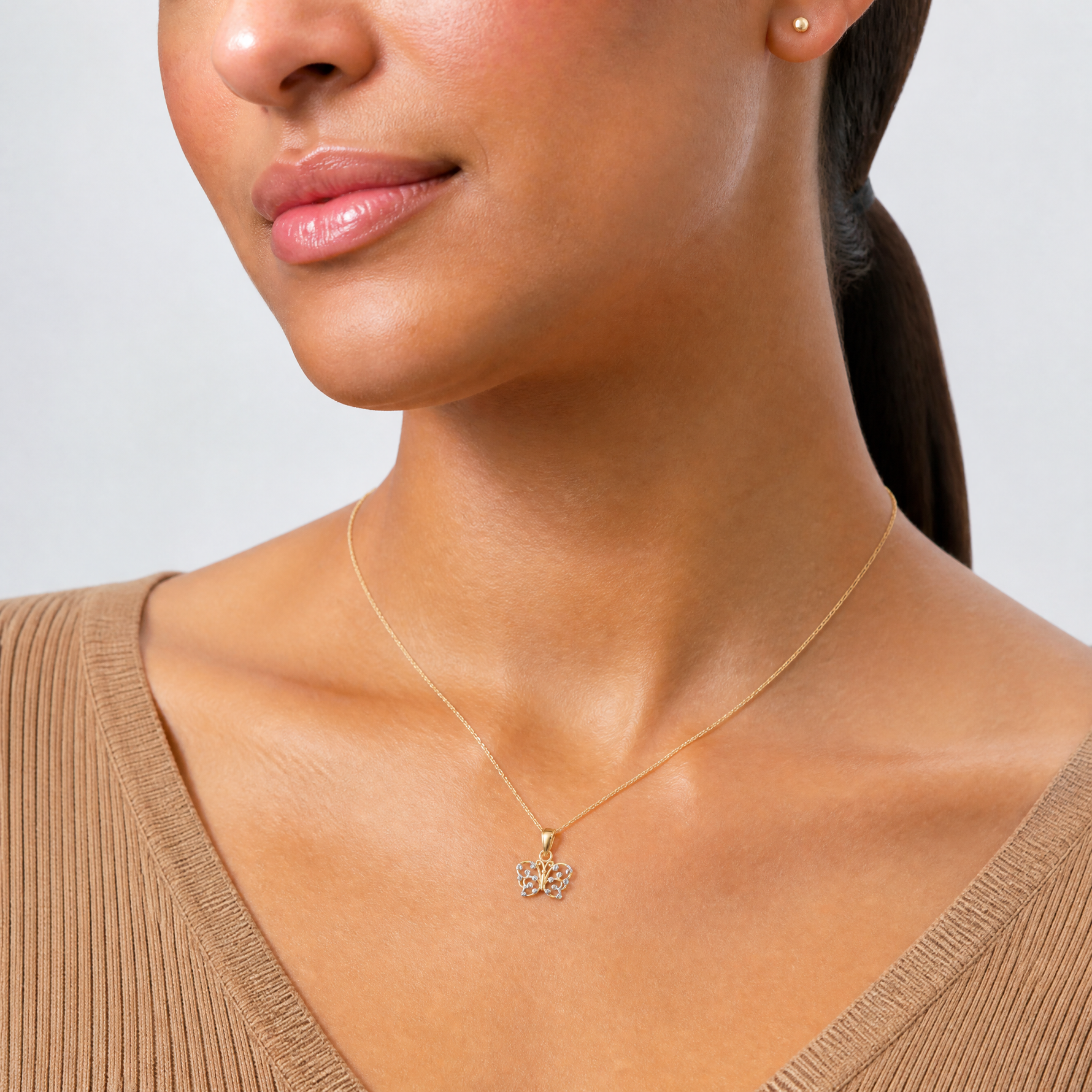 14k w/ Rhodium Diamond-cut Butterfly Charm - Model Shot
