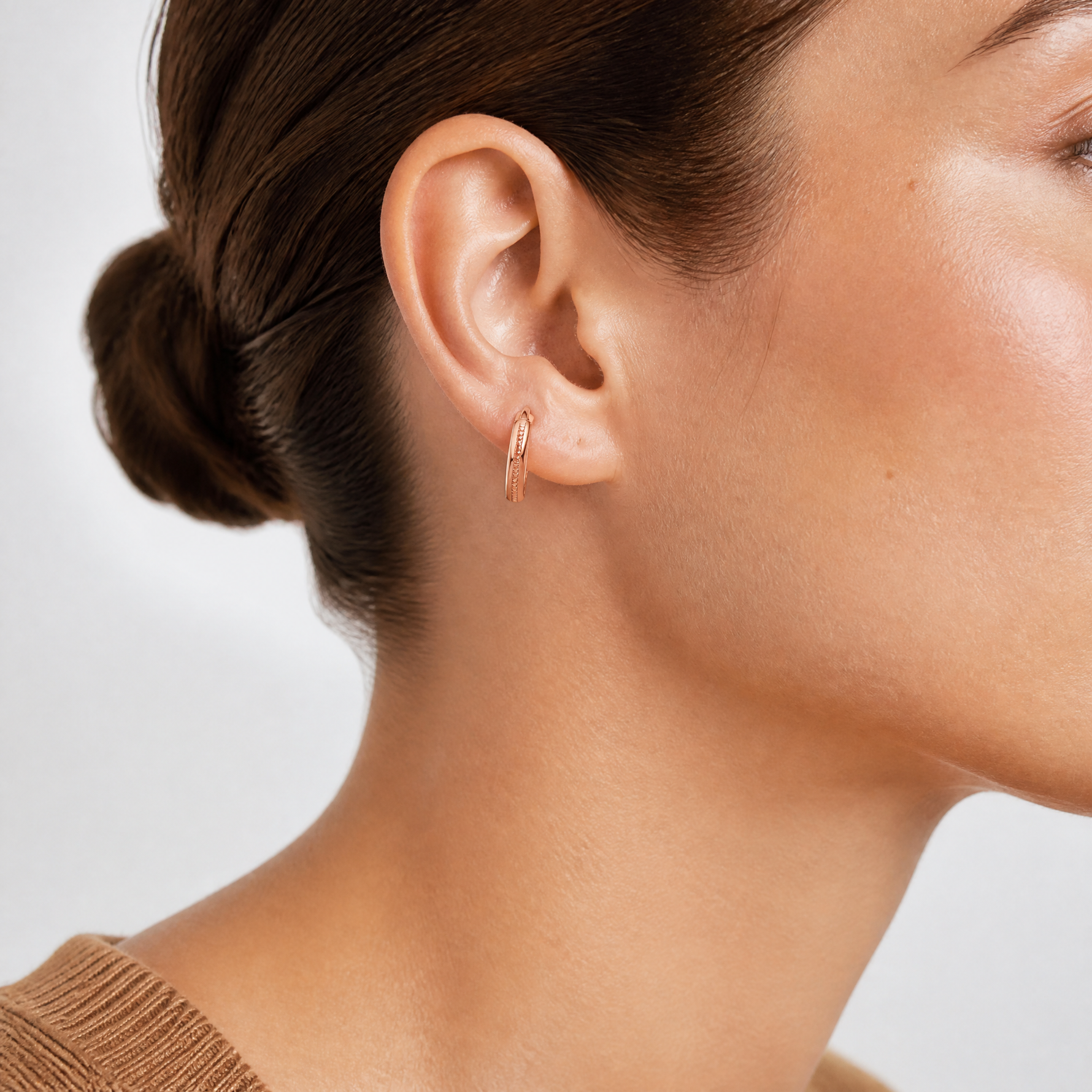 Leslie's 14K Rose Gold Polished and Textured Huggie Hoop Earrings - Model Shot