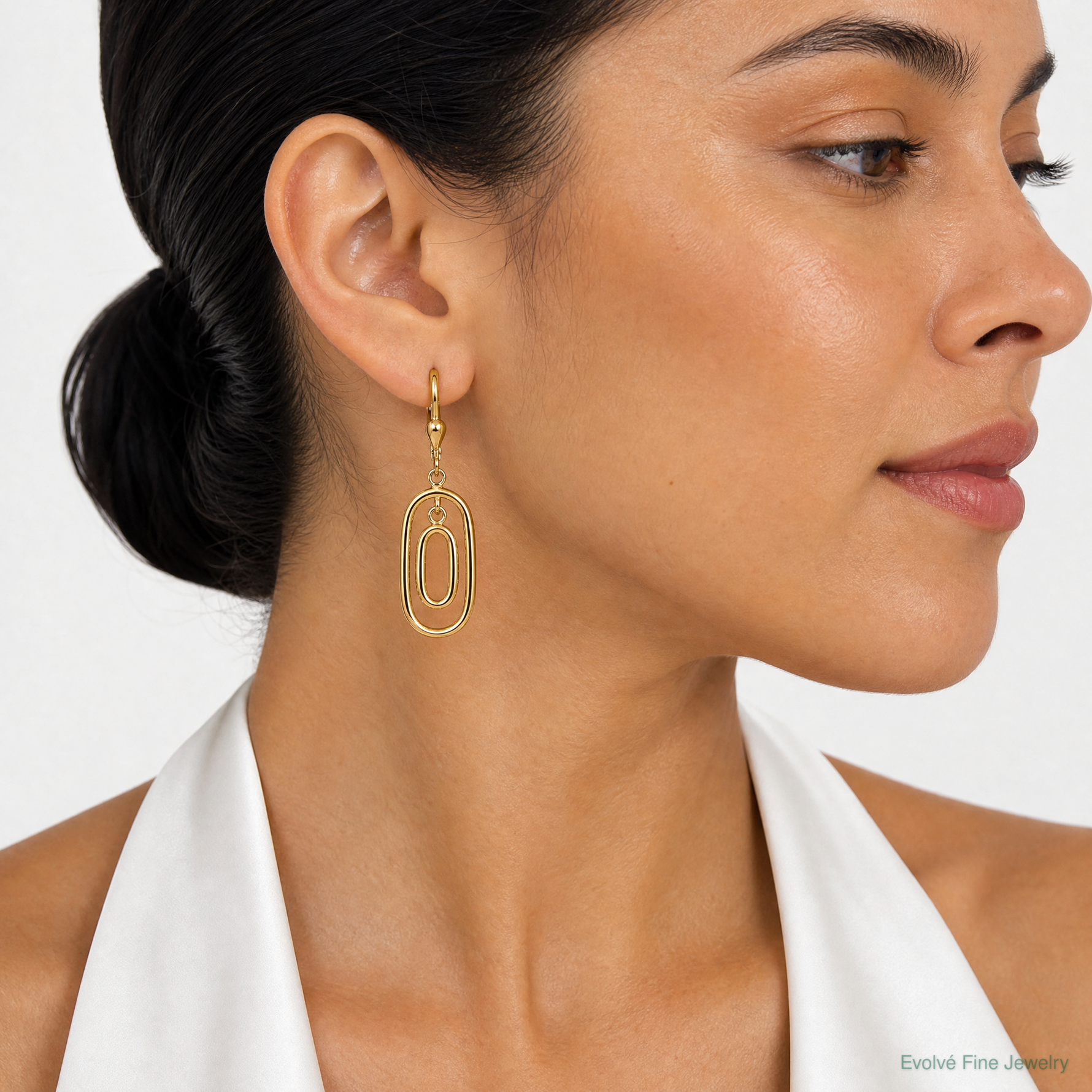 Leslie's 14K Polished Ovals Dangle Leverback Earrings - Model Shot