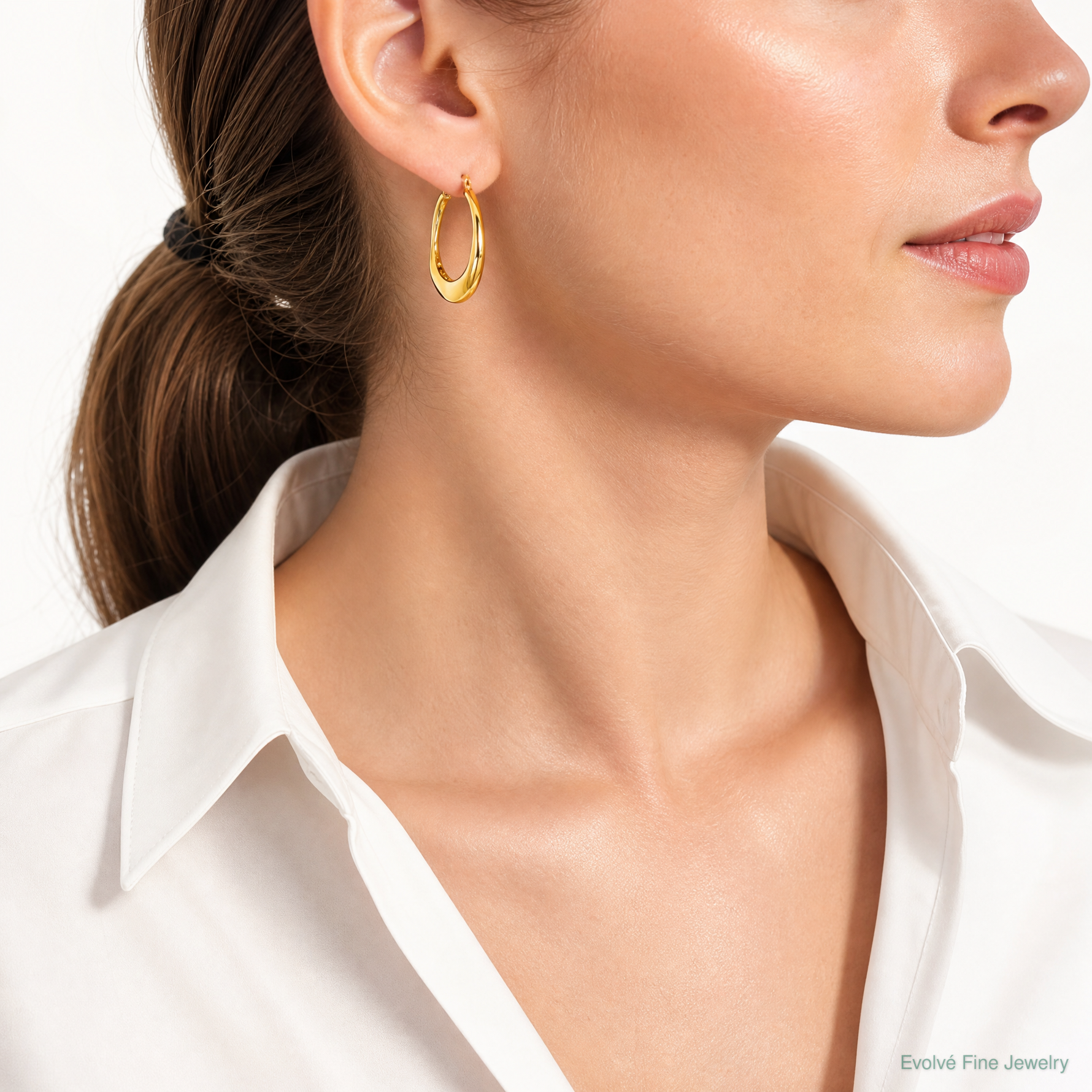 Leslie's 14K Polished Twisted Hollow Hoop Earrings - Model Shot