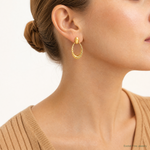 Leslie's 14K Polished and Diamond-cut Oval Dangle Post Earrings - Model Shot