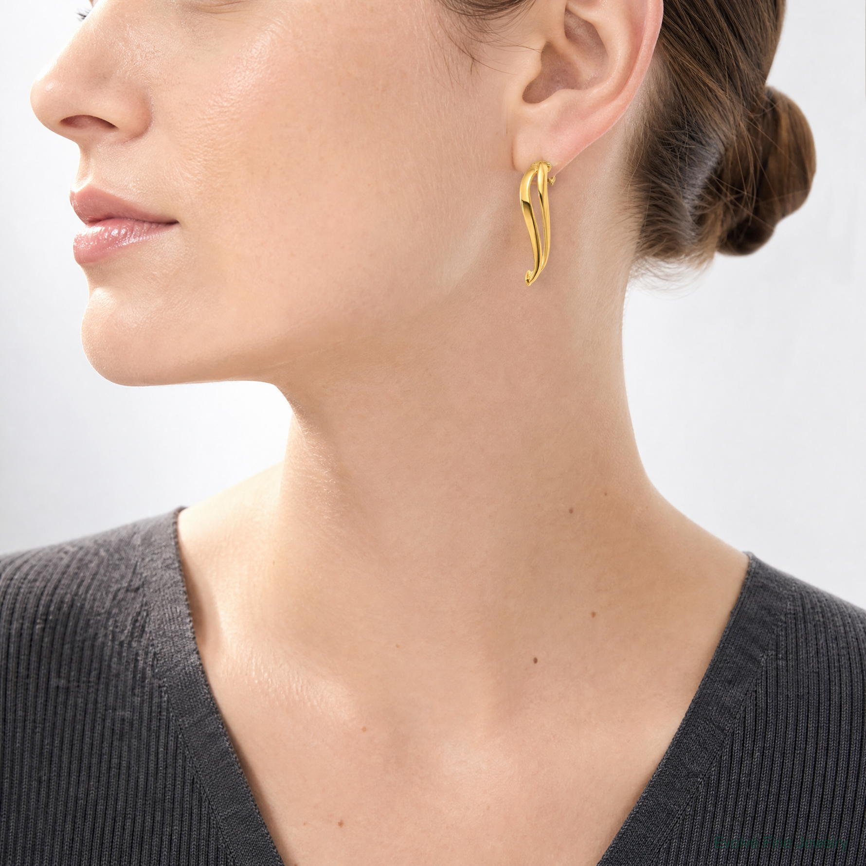 Leslie's 14K Polished Curve Post Earrings - Model Shot