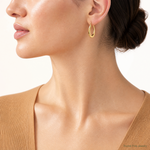 Leslie's 14K Polished Oval Hollow Hoop Earrings - Model Shot