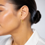 Leslie's 14K Polished Link Pattern Huggie Hoop Earrings - Model Shot