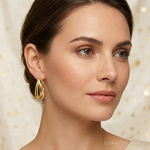 Leslie's 14K Polished Twist Hoop Earrings - Model Shot