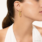 14k Textured and Polished Twist Oval Hoop Earrings - Model Shot