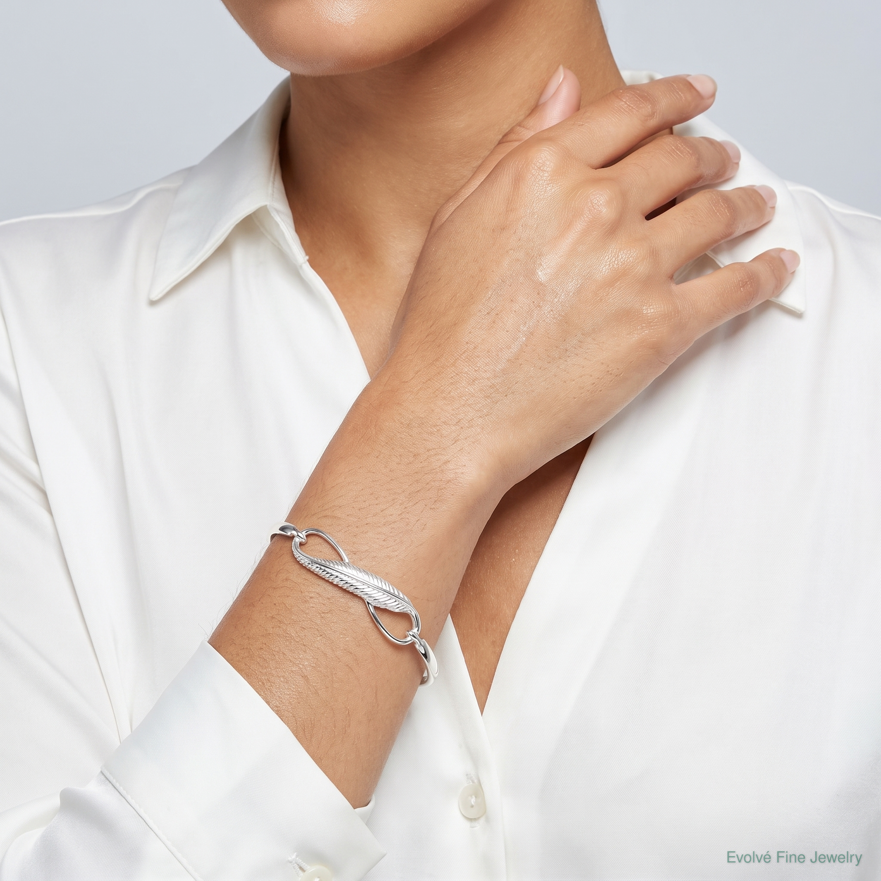 Sterling Silver Infinity w/Feather Bangle Bracelet - Model Shot