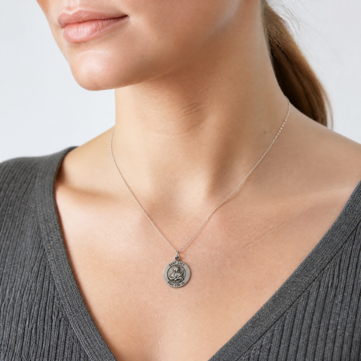 Sterling Silver Antiqued Saint Lucy Medal - Model Shot