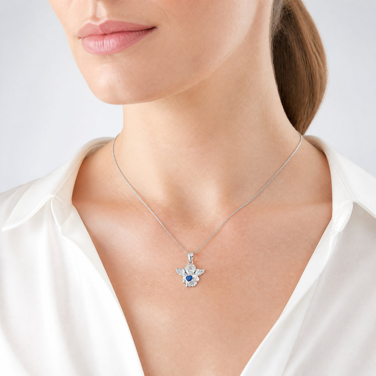Sterling Silver RH-pltd CZ Sept Birthstone Angel Ash Holder 18in Necklace - Model Shot