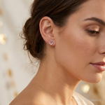 Sterling Silver Rhodium Diamond Heart Post Earrings - Model Shot