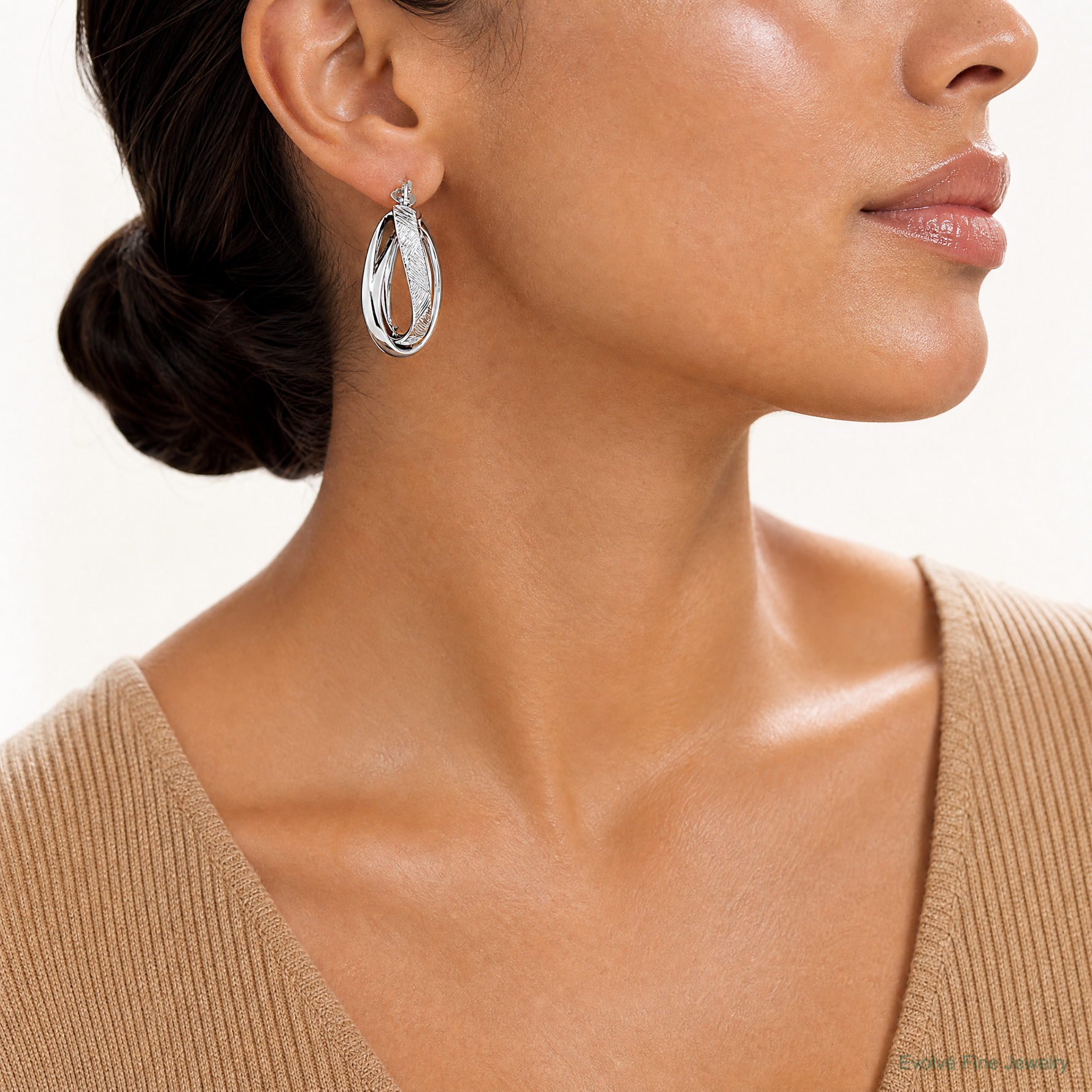 Sterling Silver Rhodium-plated Textured & Twisted Oval Hoop Earrings - Model Shot