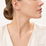 Sterling Silver Polished Round 4mm Purple CZ Stud Earrings - Model Shot