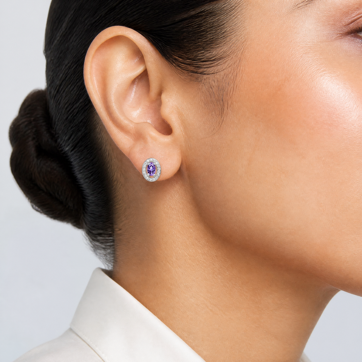 Sterling Silver Rhod-pltd June Purple and White CZ Oval Post Earrings - Model Shot