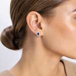 Sterling Silver Rhod-plated Blue and White CZ Oval Stud Earrings - Model Shot