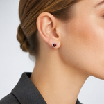 Sterling Silver Rhodium-plated Polished Garnet Round Post Earrings - Model Shot