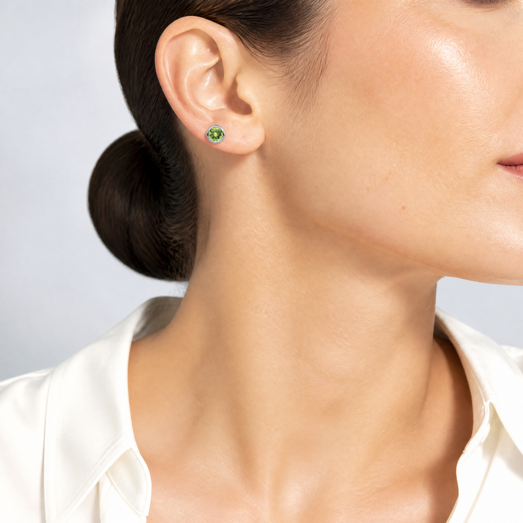 Sterling Silver Rhodium-plated Polished Peridot Round Post Earrings - Model Shot