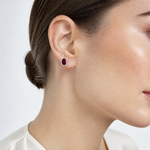 Sterling Silver Rhodium-plated Polished Garnet Oval Post Earrings - Model Shot