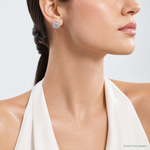 Sterling Silver Rhodium-plated Blue Topaz Studs with Earring Jackets - Model Shot