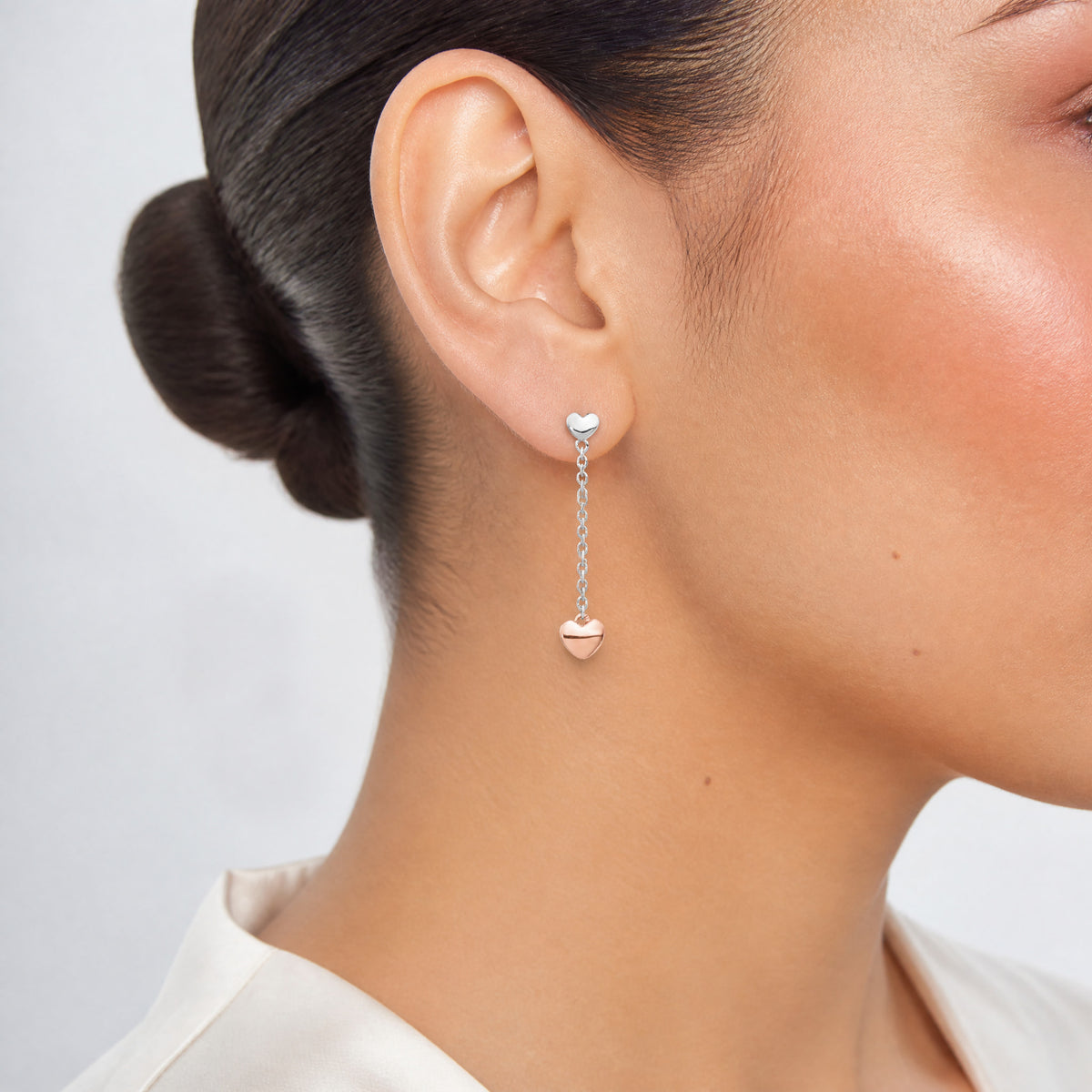 Sterling Silver RH-plated Rose gold-plated Heart Post Earrings - Model Shot