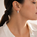 Sterling Silver Rhodium-plated Textured 5x20mm Hoop Earrings - Model Shot