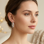 Sterling Silver Polished 4mm Oval Hoop Earrings - Model Shot