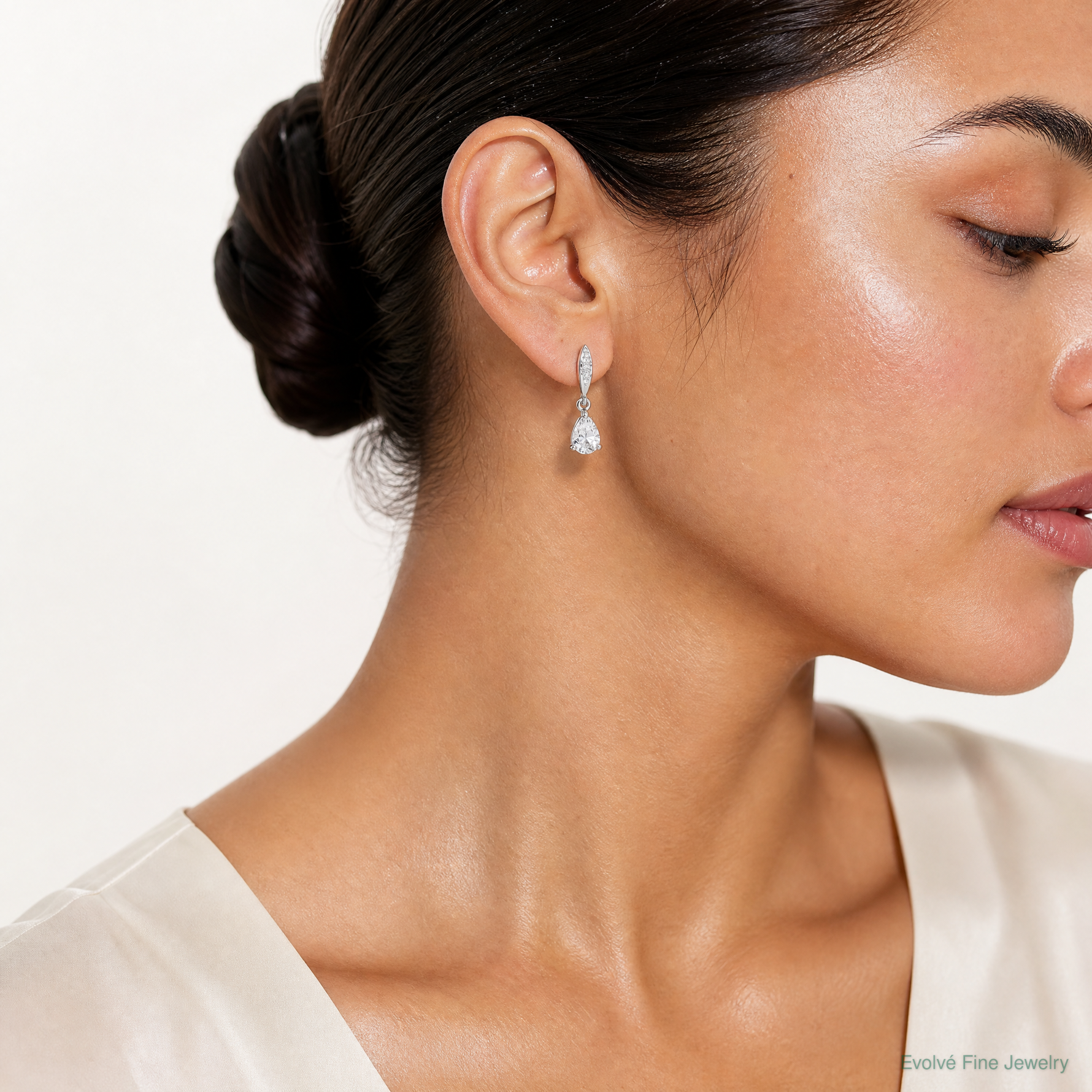 Sterling Silver Rhodium-plated Polished Pear CZ Post Dangle Earrings - Model Shot