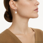 Sterling Silver Rhodium-plated CZ and Imitation Shell Pearl Dangle Earrings - Model Shot