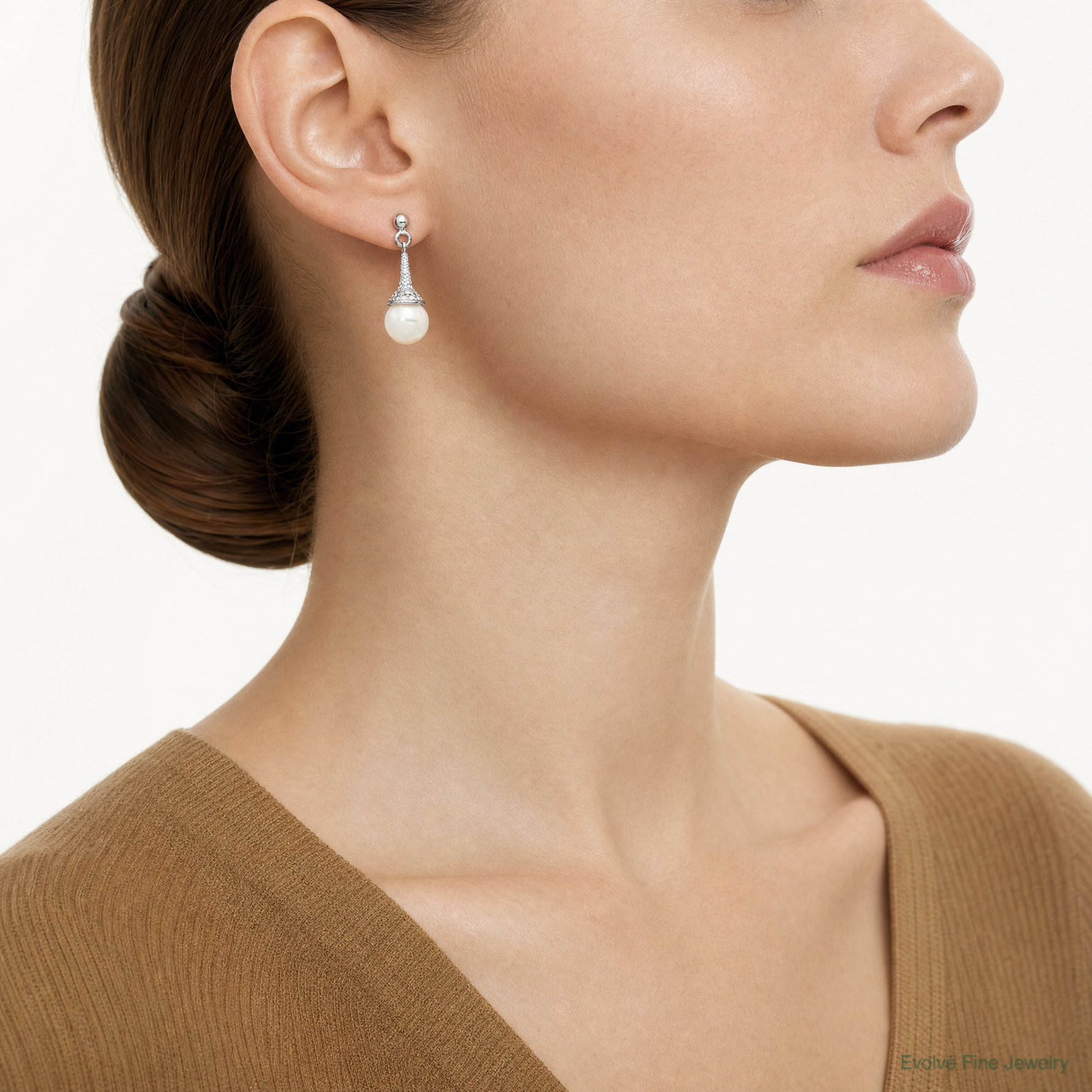 Sterling Silver Rhodium-plated CZ and Imitation Shell Pearl Dangle Earrings - Model Shot