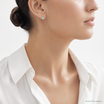 Sterling Silver RH-pltd Polished Blue Created Opal Teardrop Stud Earrings - Model Shot