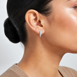 Sterling Silver Polished and Textured Wing Post Earrings - Model Shot