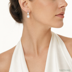 Sterling Silver E-coated Polished 6-7mm Shell Pearl and CZ Post Earrings - Model Shot