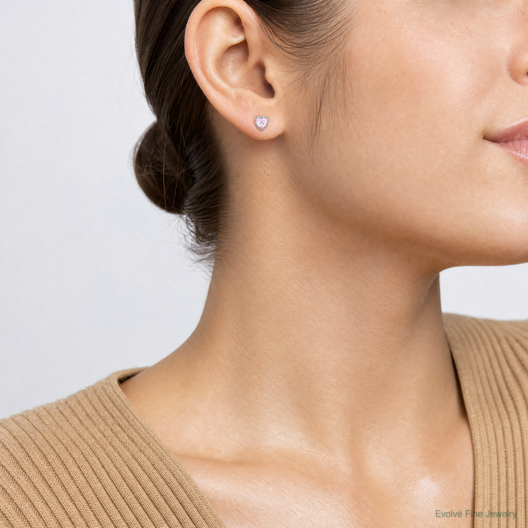 Sterling Silver Rhodium-plated Pink CZ Heart Post Earrings - Model Shot