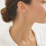 Sterling Silver Rhodium-plated CZ Polished Small Twist Hoop Earrings - Model Shot