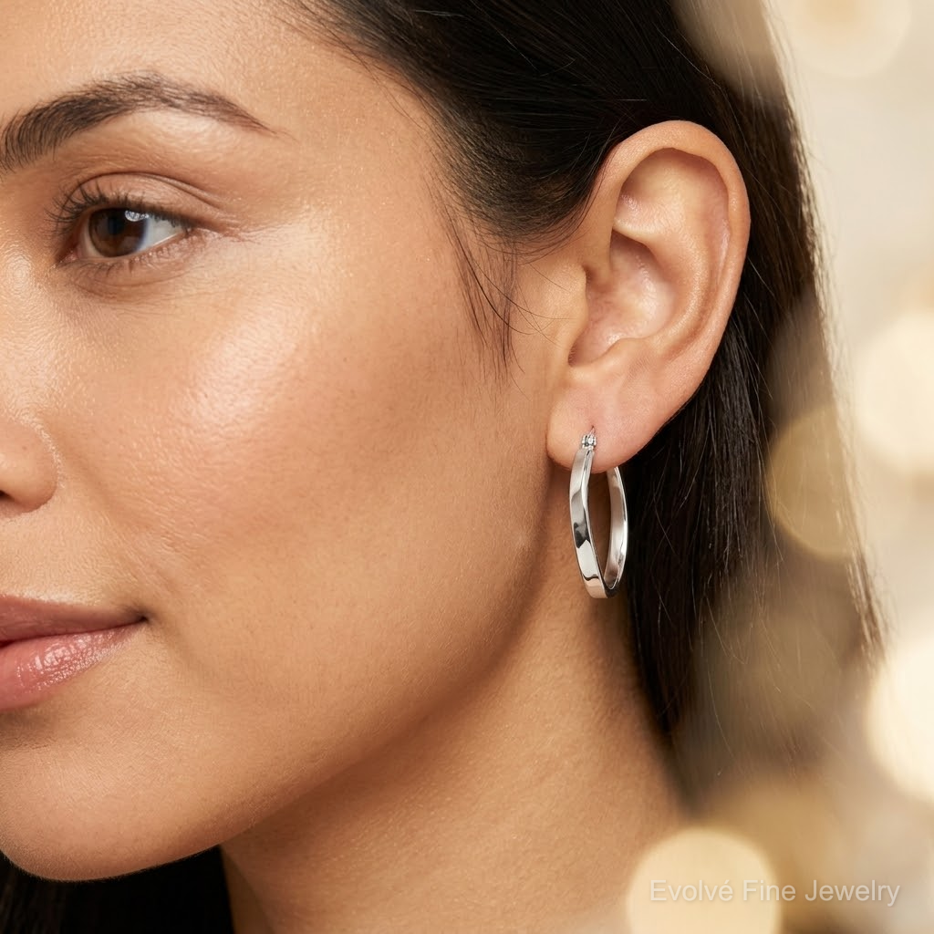 Sterling Silver Polished & Twisted Oval Hoop Earrings - Model Shot