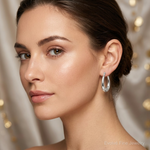 Sterling Silver Polished & Tapered Oval Hoop Earrings - Model Shot