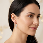 Sterling Silver Rhodium-plated 1.5mm Oval Omega Back Hoop Earrings - Model Shot