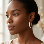 Sterling Silver Polished & Tapered Oval Hoop Earrings - Model Shot