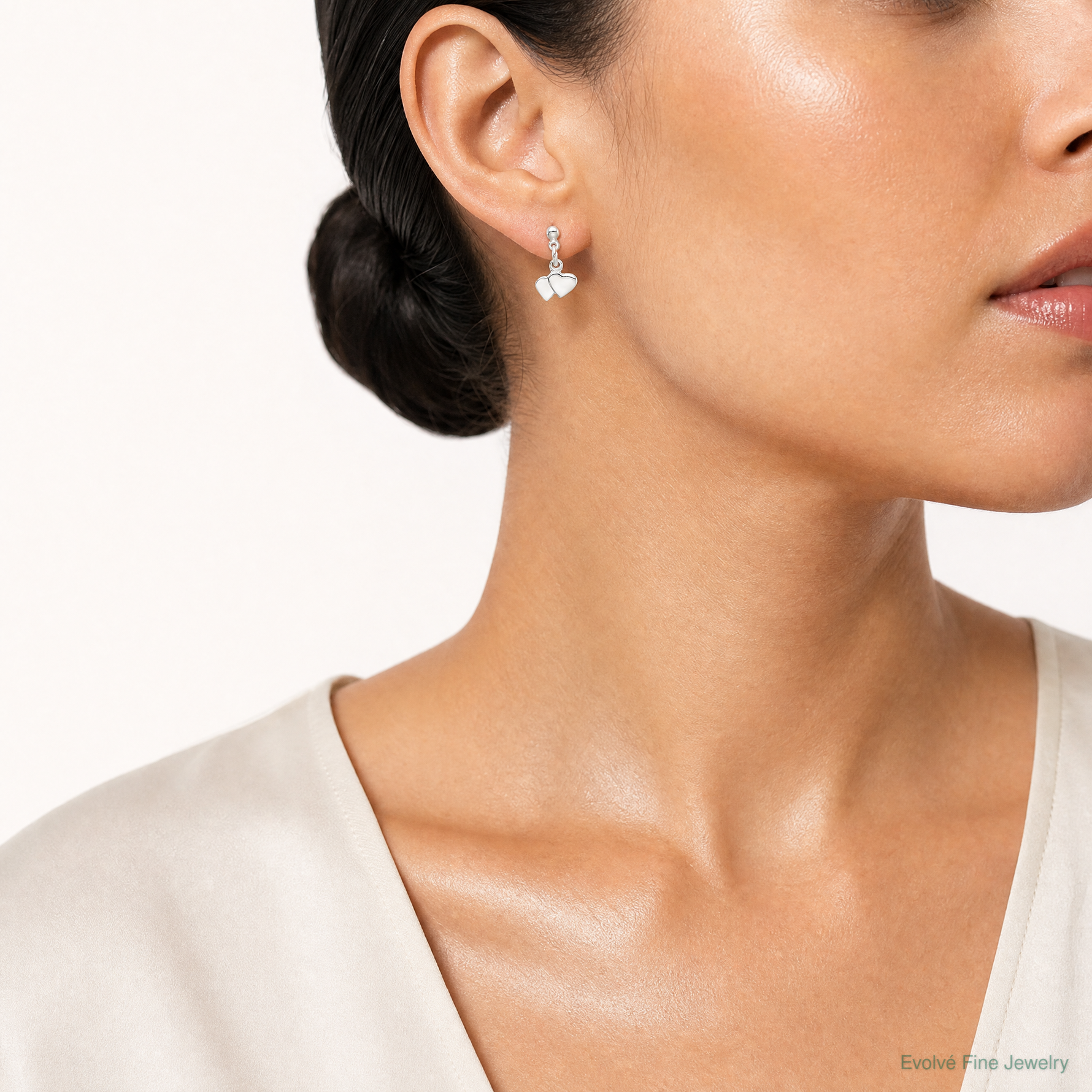 Sterling Silver Dangling Hearts Earrings - Model Shot