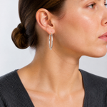 Sterling Silver Rhodium-plated 2mm Diamond Cut Hoop Earrings - Model Shot
