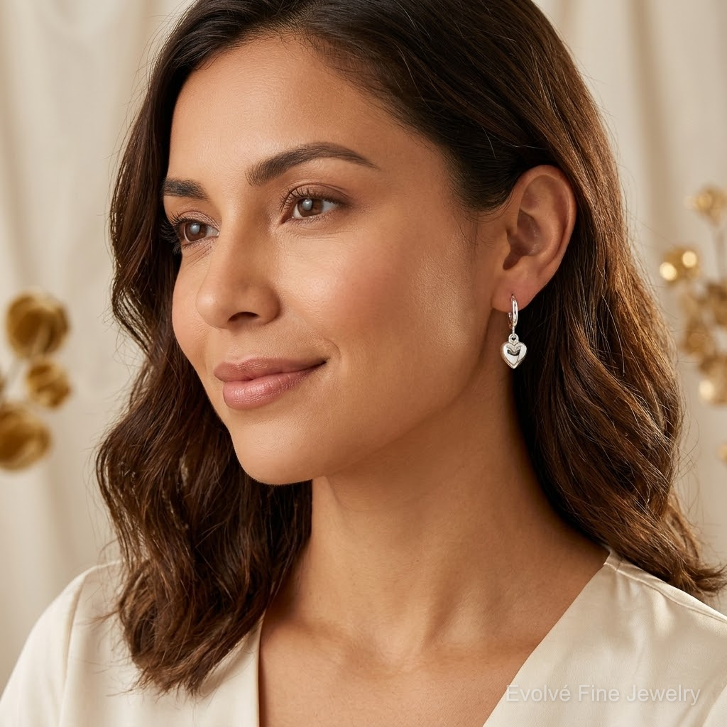 Sterling Silver Polished Puff Heart Dangle Hoop Earrings - Model Shot