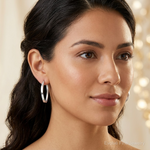 Sterling Silver RH-plated Polished/Satin Twisted Oval Hoop Earrings - Model Shot