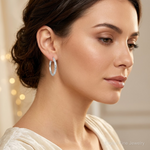 Sterling Silver Rhodium Plated Diamond Cut Oval Hoop Earrings - Model Shot
